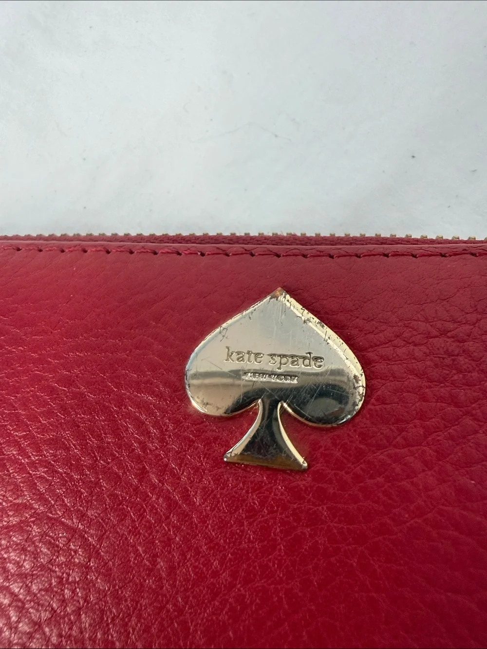 kate spade Red Pebbled Leather Zip Wallet with Gold Spade Accent